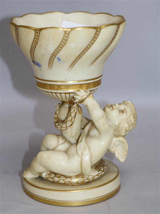 A late 19th century Minton ivory porcelain figural sweetmeat dish H.18cm